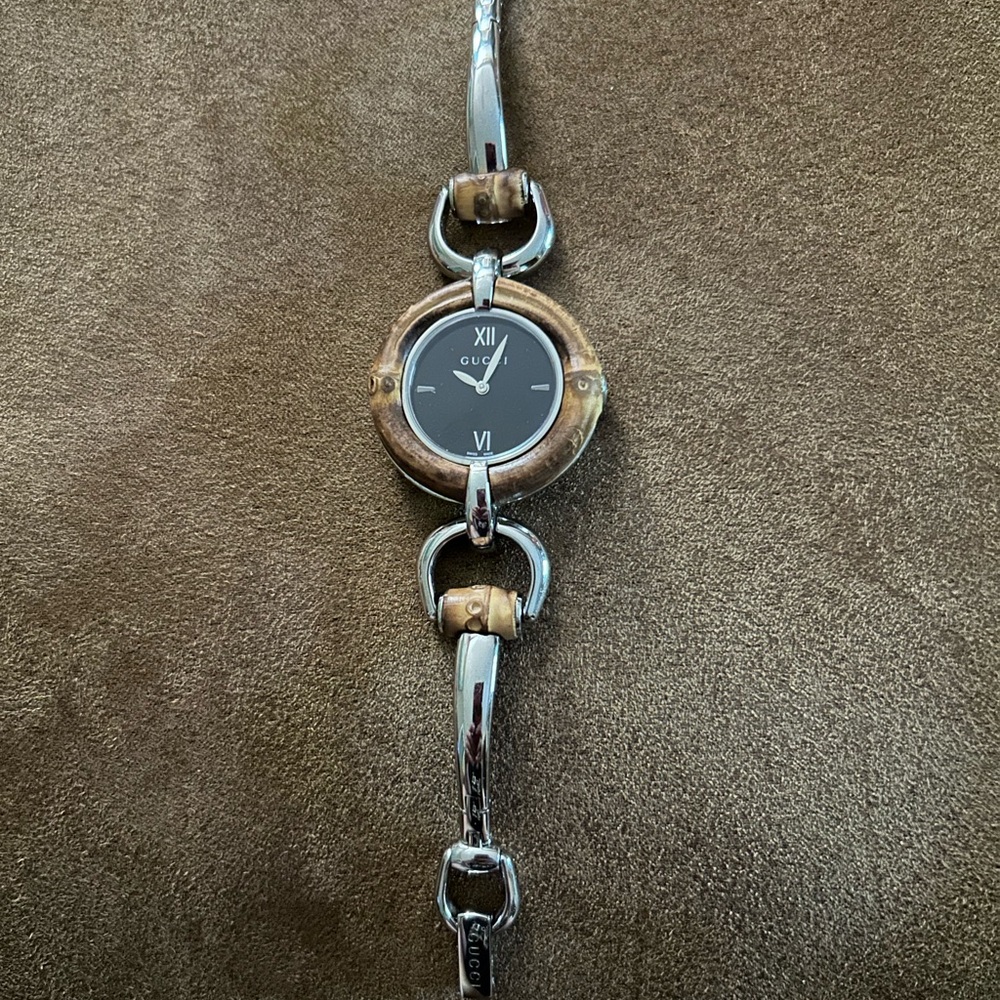 Gucci Women's Silver and Brown Watch